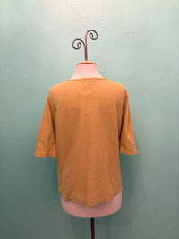 Back view of Mustard Seed linen cotton short sleeve tee on mannequin