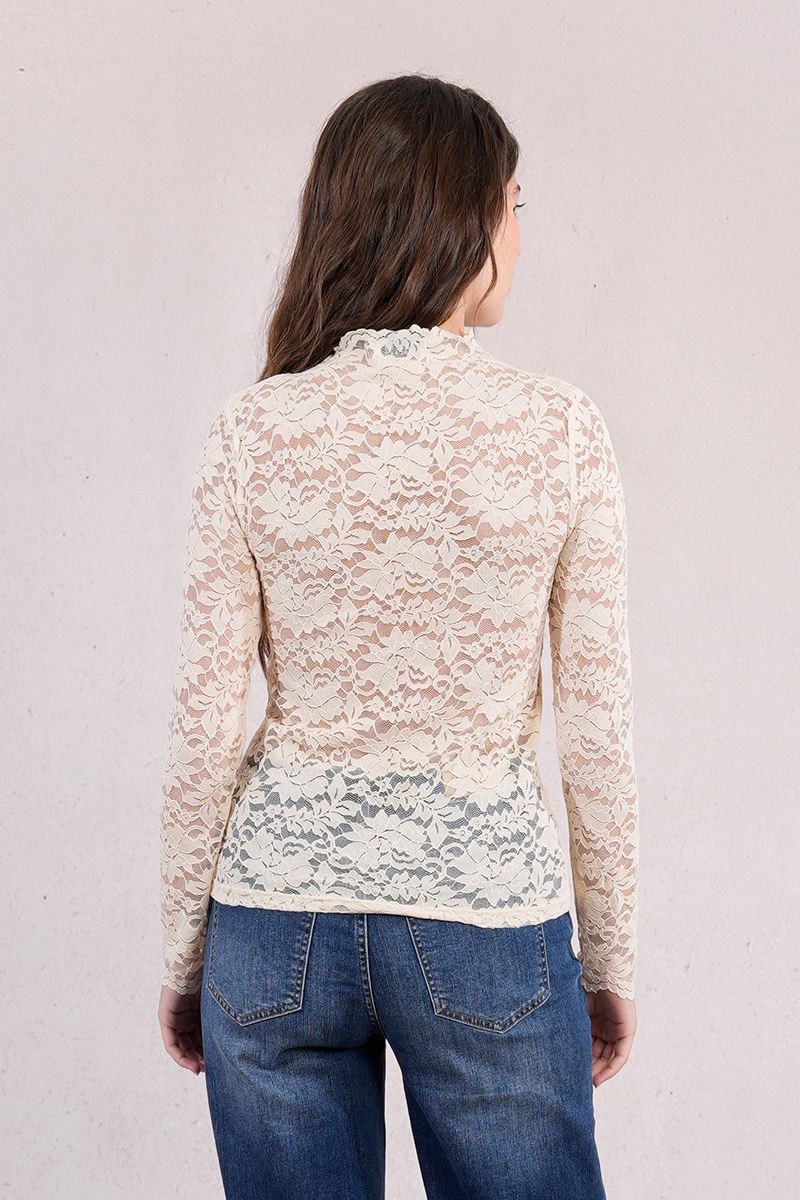 Back view of the ivory lace long sleeve mock neck top
