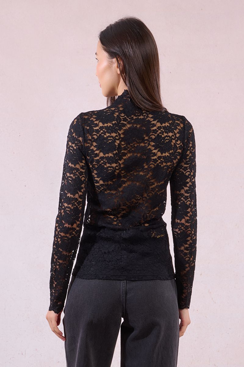 Back view of black lace turtleneck top, showing intricate floral lace design