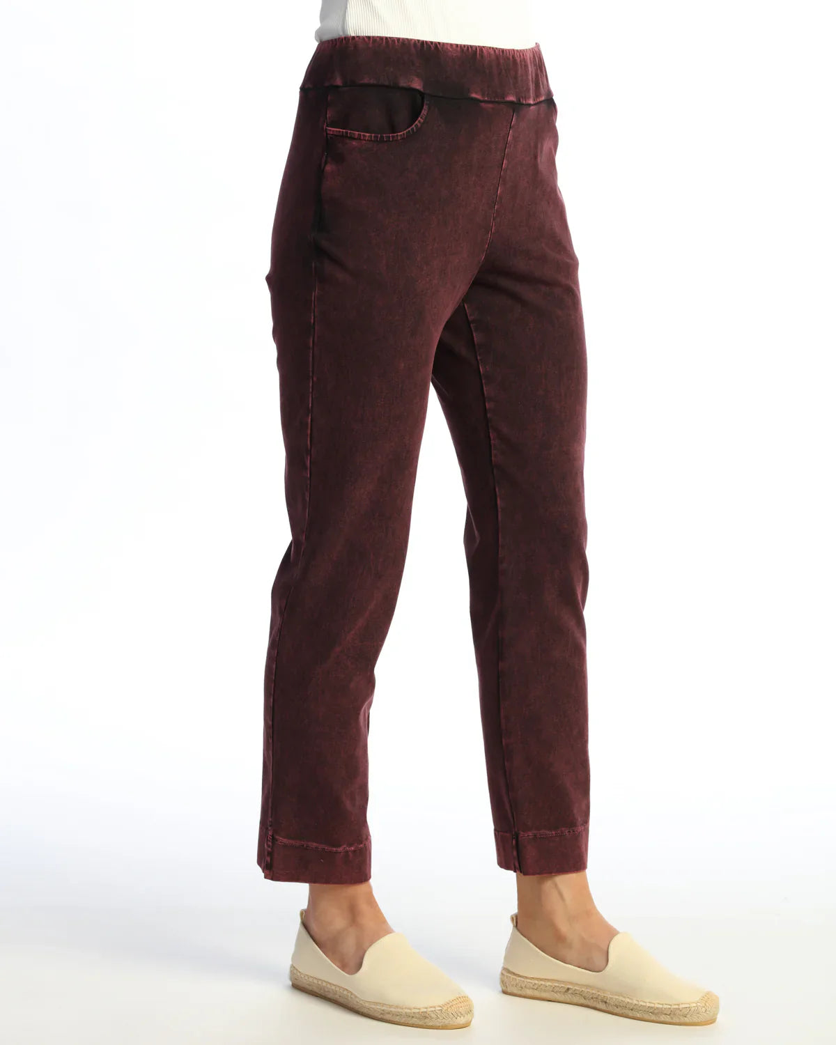 Side view of women's burgundy stretch ankle pants with relaxed fit
