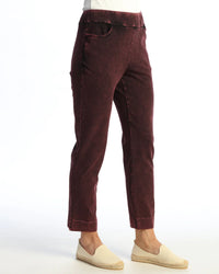 Side view of women's burgundy stretch ankle pants with relaxed fit