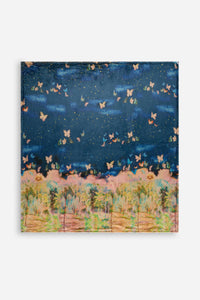 Blanket section with colorful butterflies, stars, and a dreamy night sky landscape
