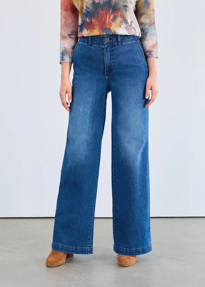 Front close-up of vintage wide-leg high-rise jeans with faded wash