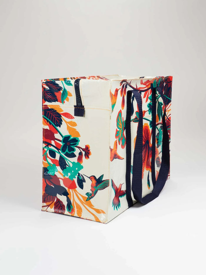 Reusable tote bag decorated with colorful hummingbirds and floral patterns