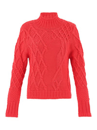 Front view of coral cable knit sweater with mock neck design