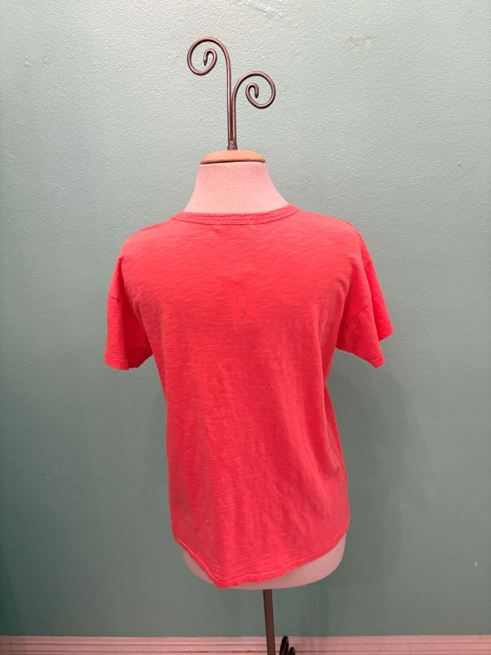 Back view of a coral pink short sleeve women's t-shirt displayed on mannequin