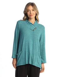 Close-up of teal asymmetrical button knit tunic with side pockets