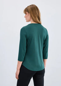 Back view of emerald green 3/4 sleeve V-neck top