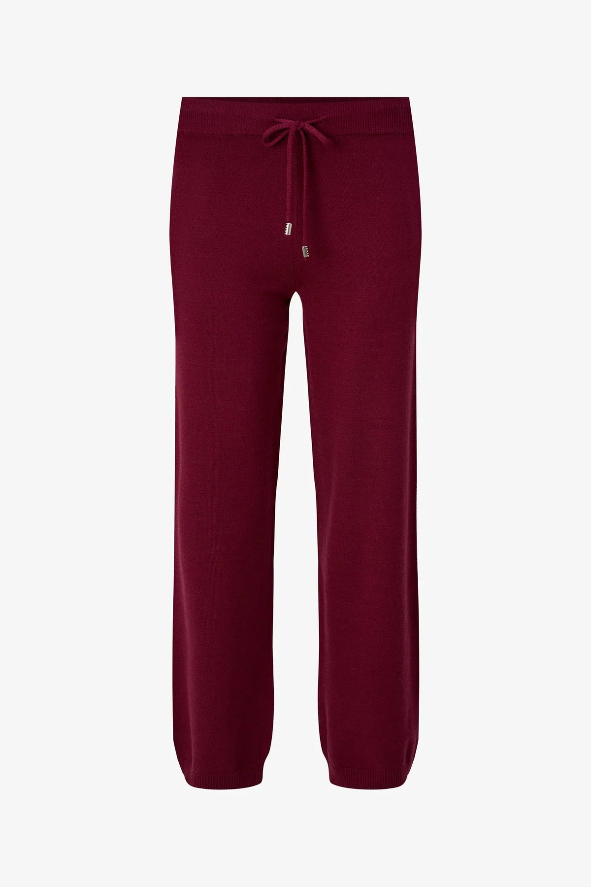 Burgundy knit jogger pants with drawstring laid flat on a white background