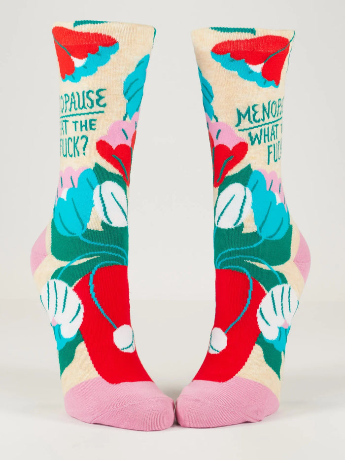 Pair of Menopause WTF statement socks displayed with vibrant floral design