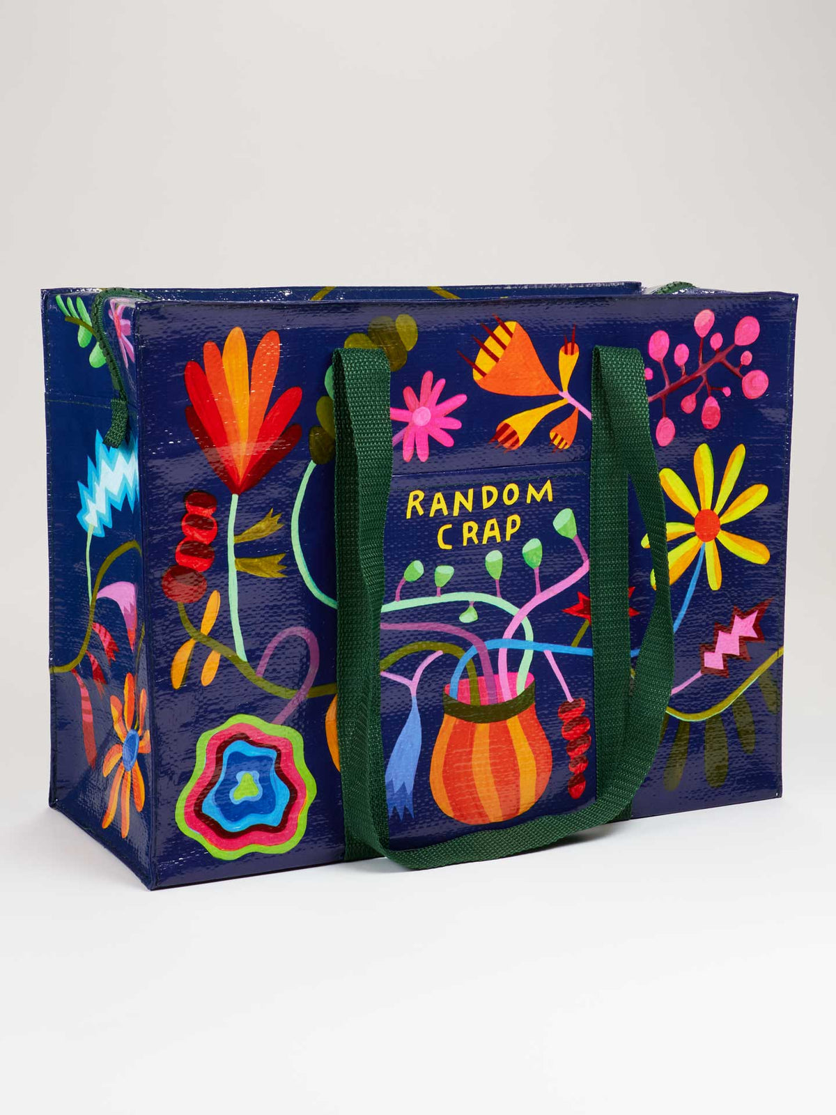 Front view of 'Random Crap' reusable tote bag with bold, multicolored flowers