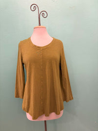 Front view of olive green casual long sleeve top displayed on mannequin