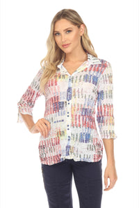 Model front view wearing Color Burst Crinkle Button-Up Blouse with blue pants