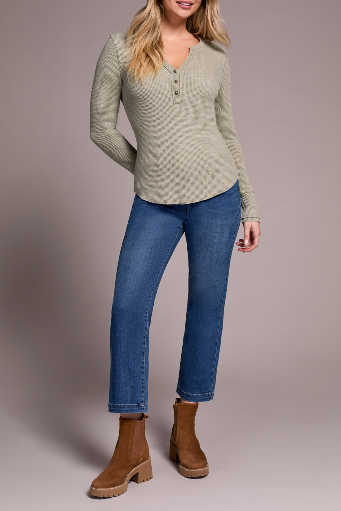 Full front view of straight-leg blue denim jeans paired with tan platform boots