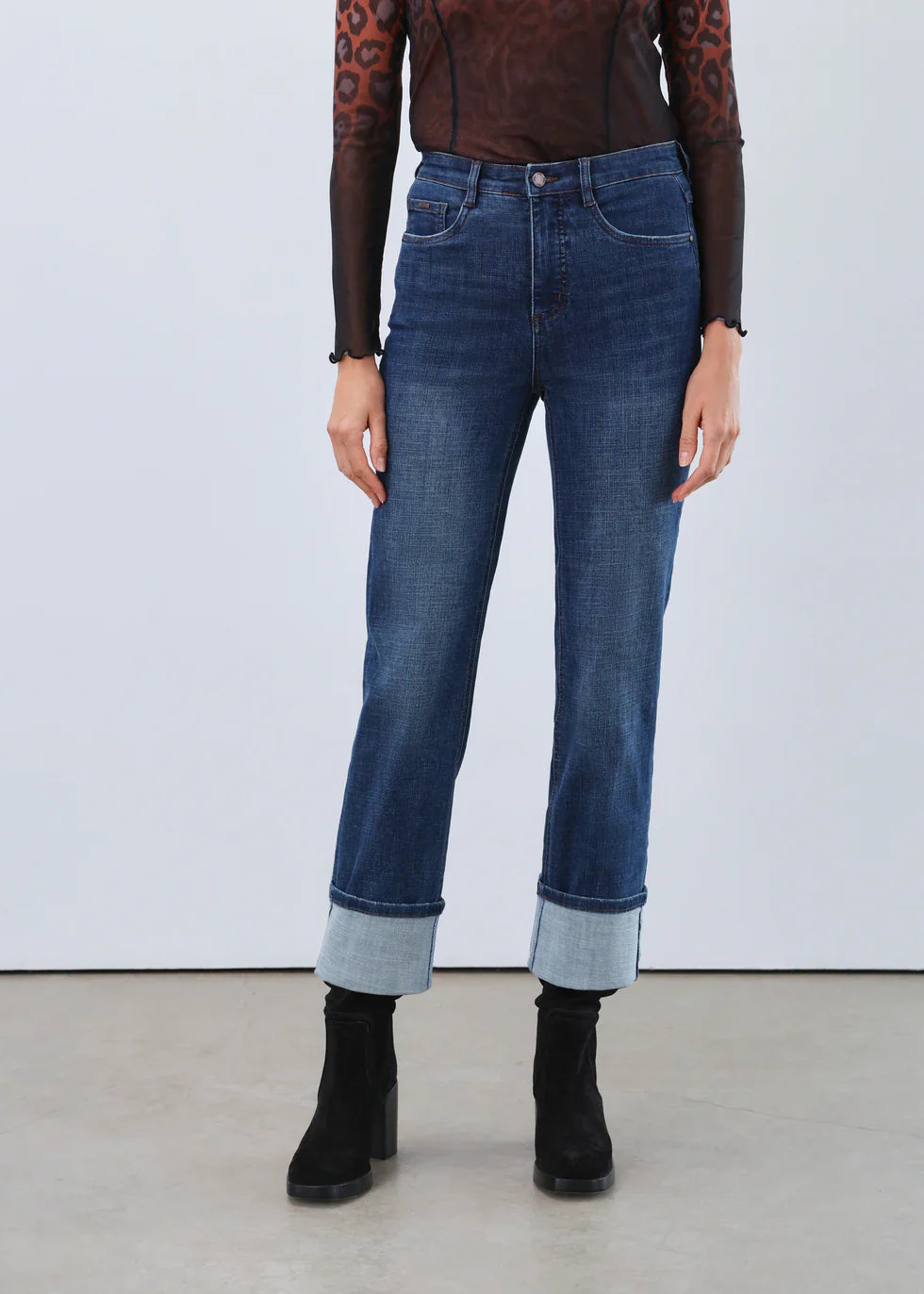 Front close-up of women's high-rise straight leg jeans with statement cuffs