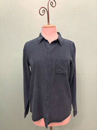 Front view of slate blue women's button-up shirt with chest pocket on mannequin