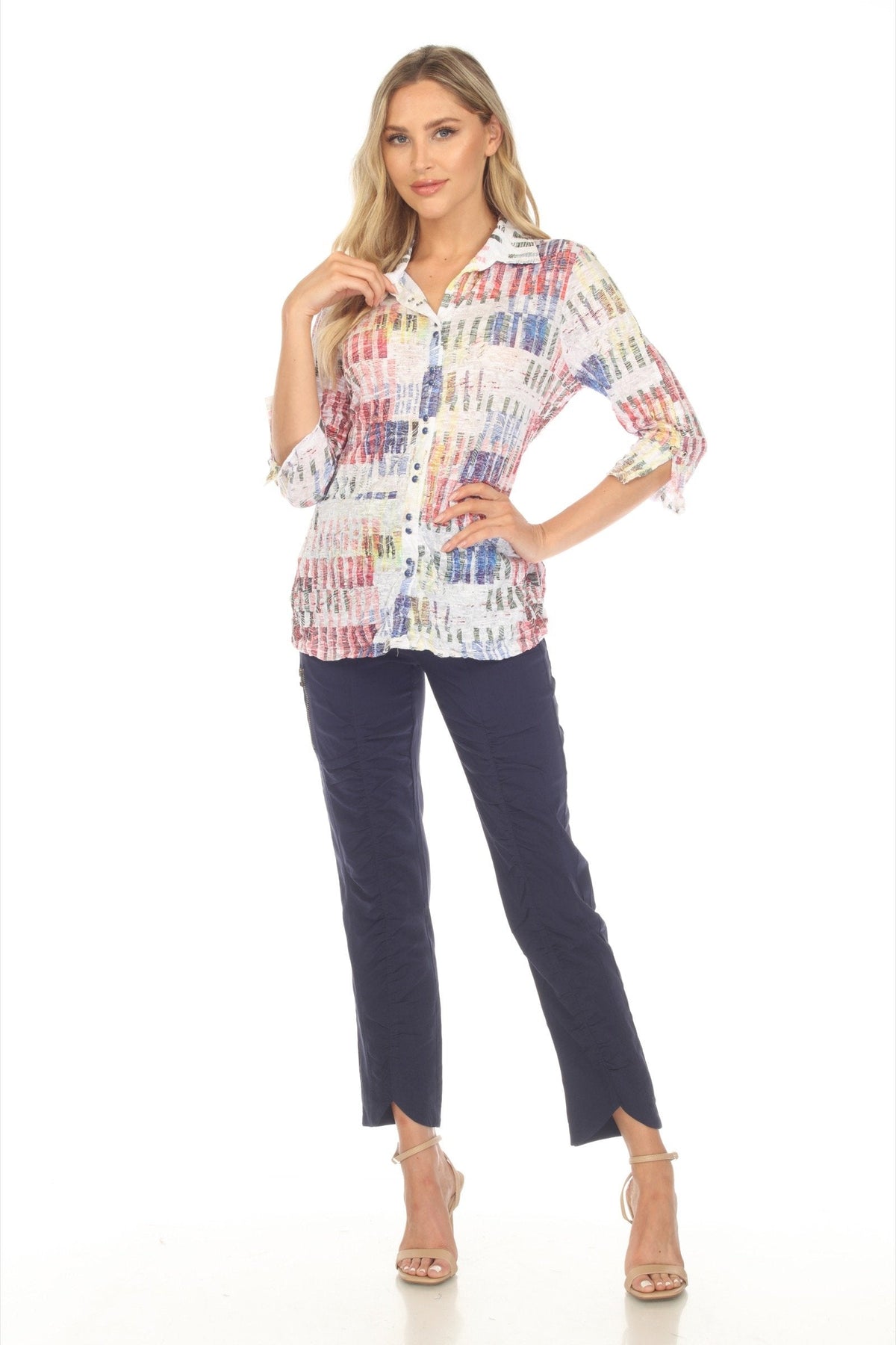 Full length of woman in Color Burst Crinkle Button-Up Blouse and navy pants