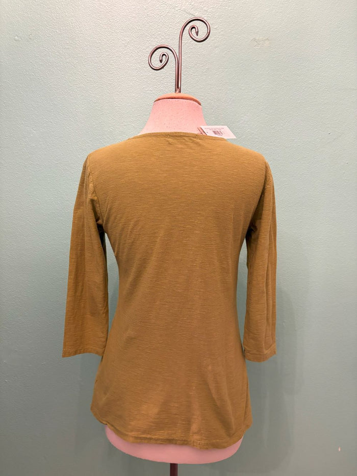 Back view of golden mustard 3/4 sleeve V-neck top on mannequin