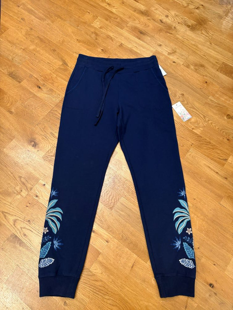 Navy blue pants with floral patterns