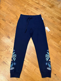Navy blue pants with floral patterns