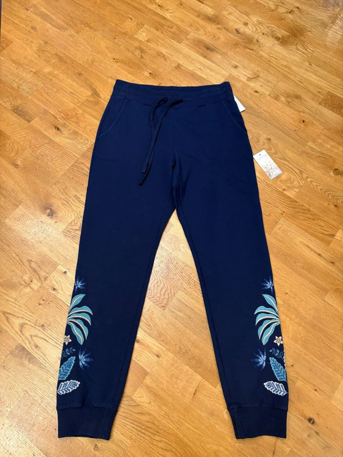 Navy blue pants with floral patterns