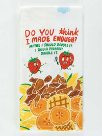 Close-up of tea towel design with smiling strawberries, pies, fried chicken, corn, and humorous kitchen quote