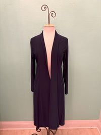 Front view of navy open-front longline cardigan on mannequin