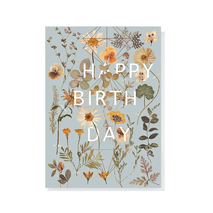 Botanical birthday card with pressed flowers and geometric design featuring HAPPY BIRTHDAY text