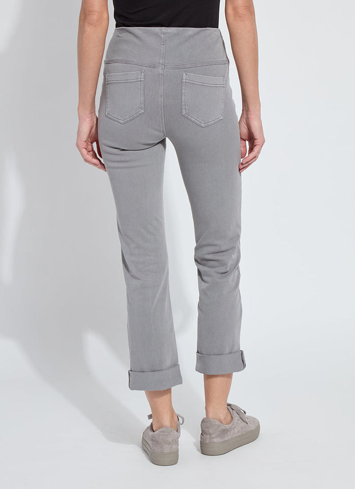 Back view of woman wearing grey rolled cuff pants with pockets