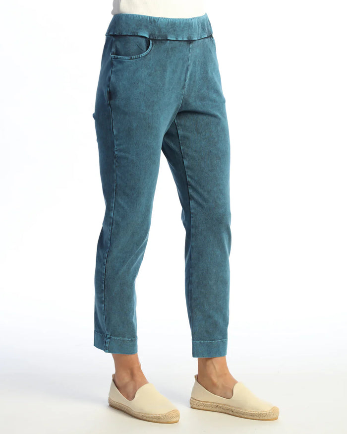 Close-up side view of vintage teal blue tapered comfort pants