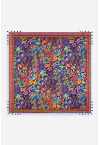 Colorful square scarf with a vivid floral pattern and blue tassel fringe