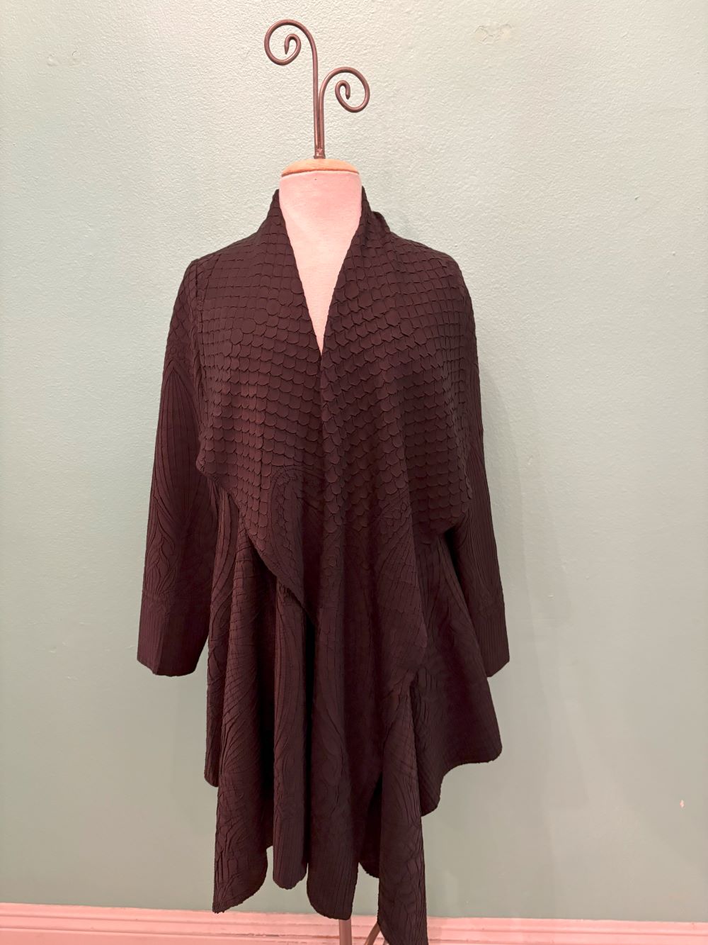 Front view of mauve waterfall cardigan with scalloped textured pattern