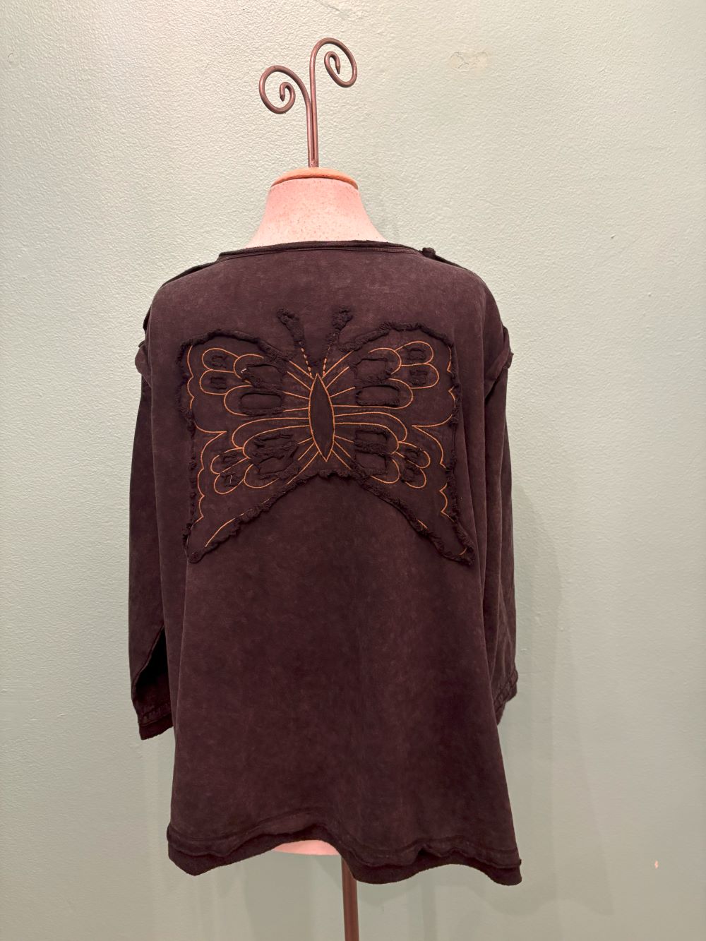Full back view of vintage brown sweatshirt featuring butterfly patchwork