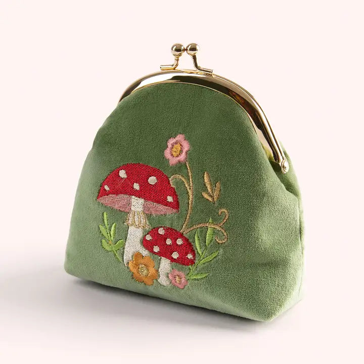 Green suede coin purse featuring whimsical red mushroom and flower embroidery