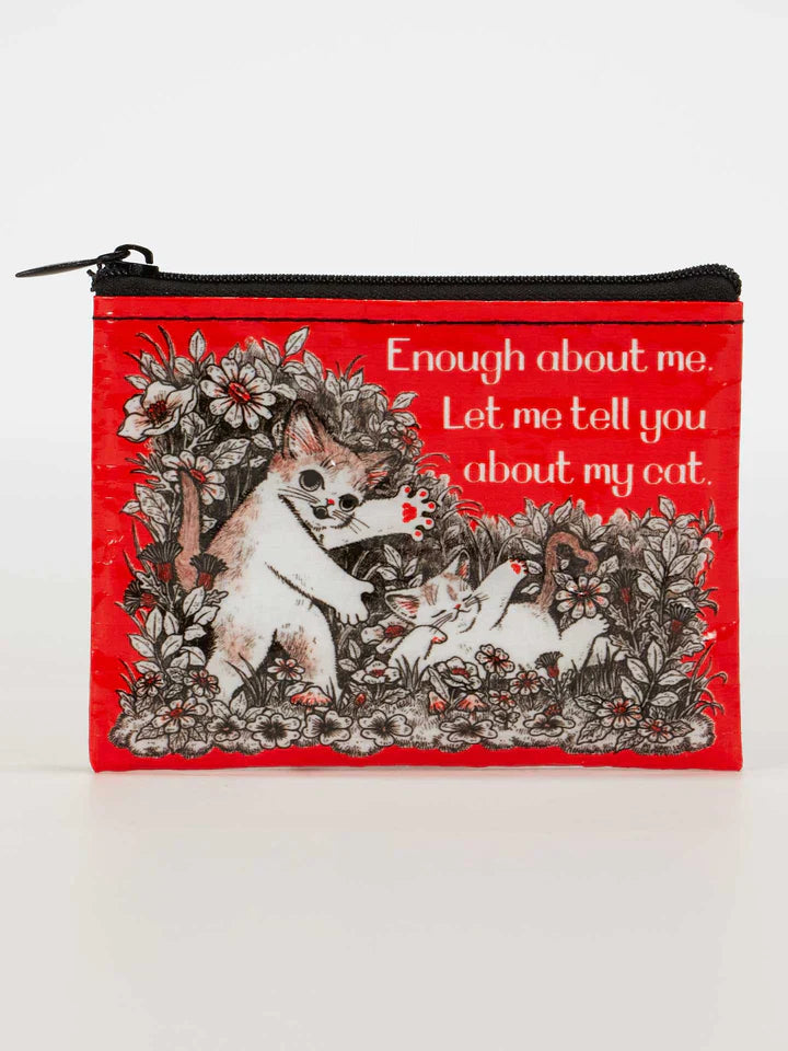 Bright red zipper pouch with vintage-style cat illustration and 'Enough about me. Let me tell you about my cat.' quote